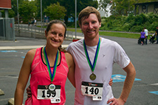 Photo of 2 participants with medals